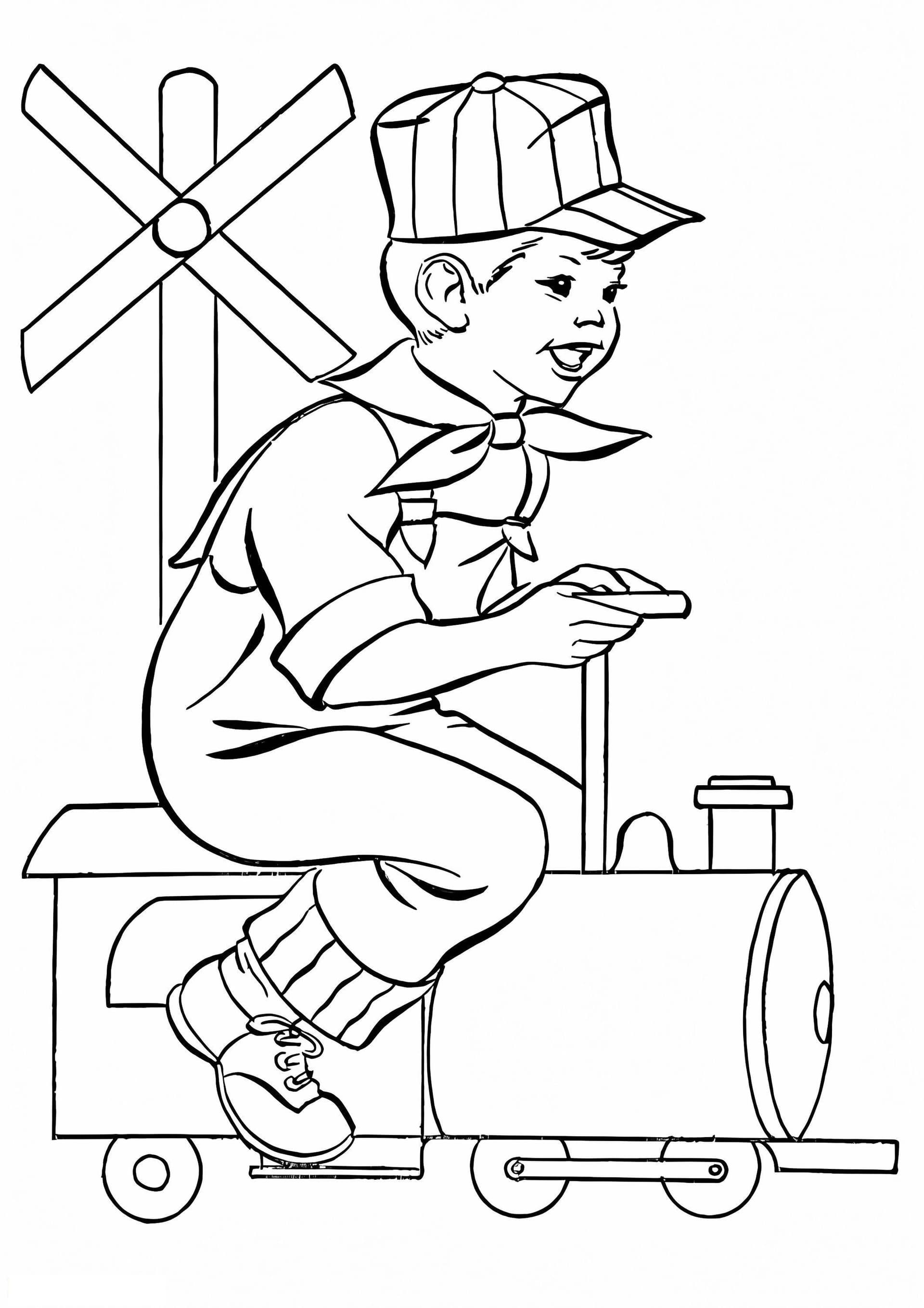 Boy On Toy Train